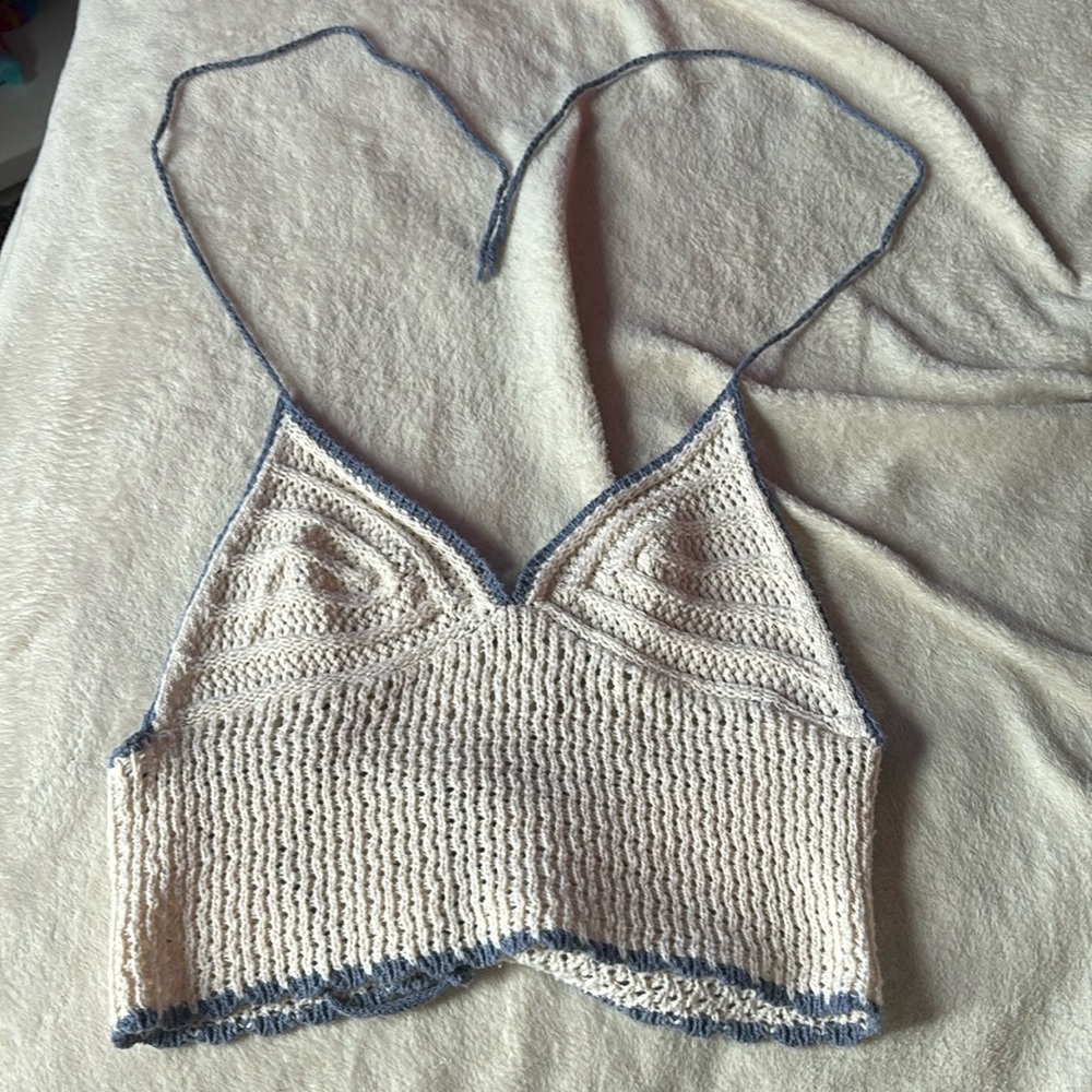 Crochet material blue and white. Never been worn. Laced in the back